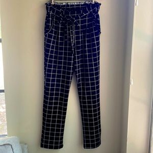 flattering straight-leg fit with spandex waistline and bow